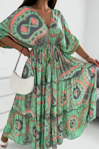 Długa zwiewna sukienka we wzory zielona